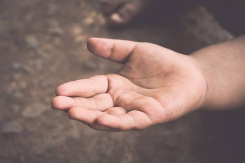 child hand begging