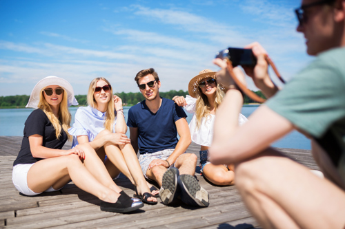 group of travellers taking photo together