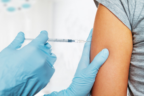 person getting his/her vaccine