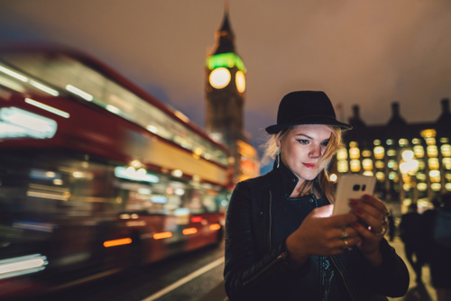 lady texting on her phone